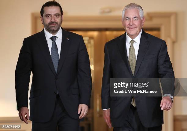 Secretary of State Rex Tillerson walks with Lebanese Prime Minister Saad Hariri at the State Department July 26, 2017 in Washington, DC. Tillerson...