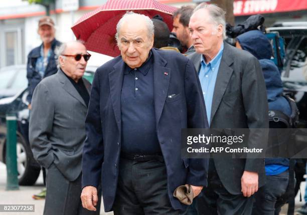 French journalist Pierre Benichou leaves after the funeral ceremony for late French actor Claude Rich, at the Saint-Pierre - Saint-Paul church in...