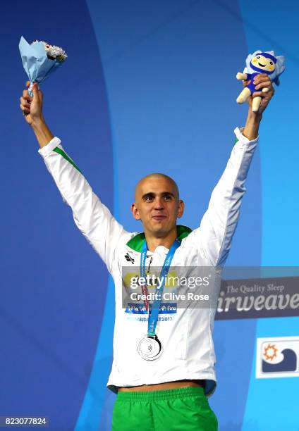 Silver medalist Laszlo Cseh of Hungary poses with the medal won during the Men's 200m Butterfly final on day thirteen of the Budapest 2017 FINA World...