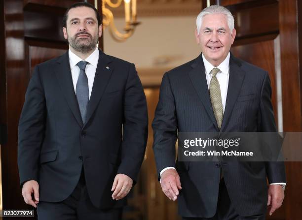Secretary of State Rex Tillerson walks with Lebanese Prime Minister Saad Hariri at the State Department July 26, 2017 in Washington, DC. Tillerson...