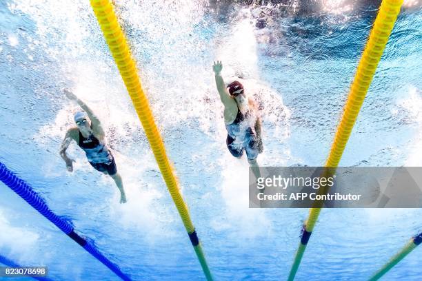 This picture taken with an underwater camera shows USA's Katie Ledecky and Russia's Veronika Popova competing in the women's 200m freestyle final...