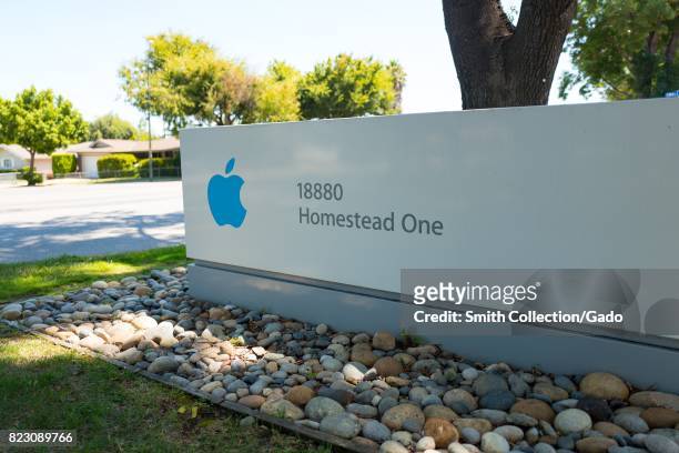 Signage with Apple Inc logo for the Homestead One office near the Apple Park, known colloquially as "The Spaceship", the new headquarters of Apple...