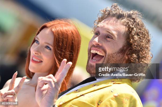 Actor T.J. Miller and wife Kate Gorney arrive at the premiere of 'The Emoji Movie' at Regency Village Theatre on July 23, 2017 in Westwood,...