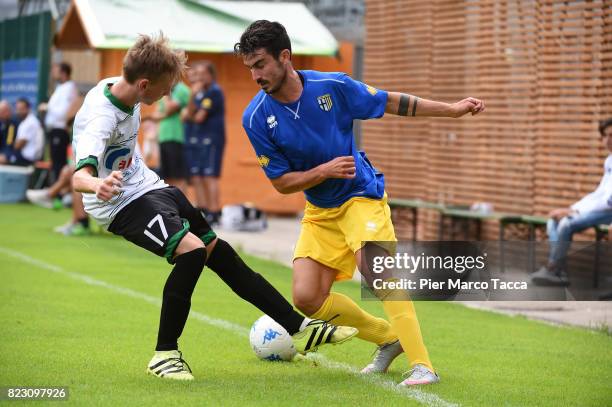 Marco Frediani of Parma Calcio competes for the ball during the pre-season friendly match between Parma Calcio and Settaurense on July 26, 2017 in...