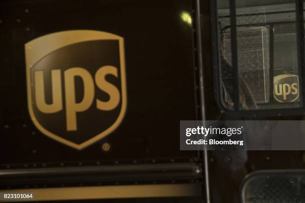 United Parcel Service Inc. Signage is seen on delivery trucks in New York, U.S, on Monday, July 24, 2017. United Parcel Service Inc. Is scheduled to...
