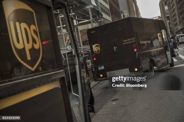 United Parcel Service Inc. Delivery truck pulls out of a parking spot on a street in New York, U.S, on Monday, July 24, 2017. United Parcel Service...