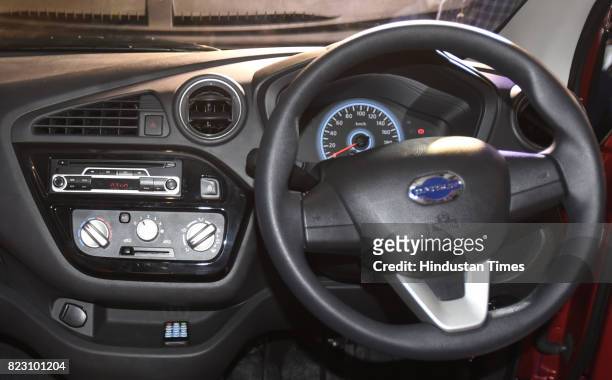Steering wheel and dashboard of new Datsun Redi-Go with one litre petrol engine on display during its launch on July 26, 2017 in New Delhi, India....