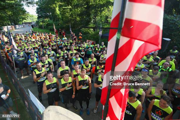 Participants prepare to take part in Tough Mudder Long Island at the Old Bethpage Village Restoration on July 22, 2017 in Old Bethpage, New York.