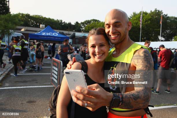 Participants arrive to take part in Tough Mudder Long Island at the Old Bethpage Village Restoration on July 22, 2017 in Old Bethpage, New York.