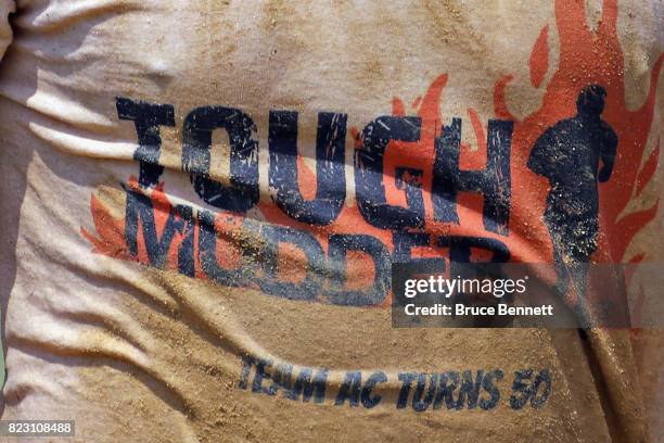 General view of signage at the Tough Mudder Long Island at the Old Bethpage Village Restoration on July 22, 2017 in Old Bethpage, New York.