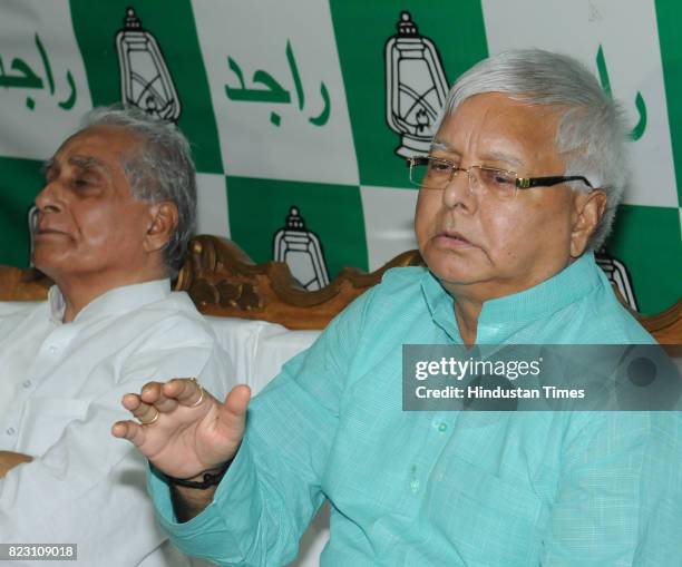 Chief Lalu Yadav speaking to media after Bihar Chief Minister Nitish Kumar submitted his resignation at Raj Bhawan on July 26, 2017 in Patna, India....