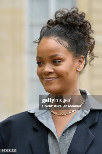 Rihanna reacts as she addresses the press after a meeting with French President Emmanuel Macron at Elysee Palace on July 26, 2017 in Paris, France....