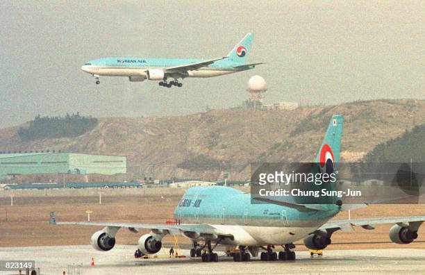 Korean Air airliners taxi and land April 6, 2001 at the newly opened Incheon International Airport, 32 miles west of Seoul. South Korea hopes the new...