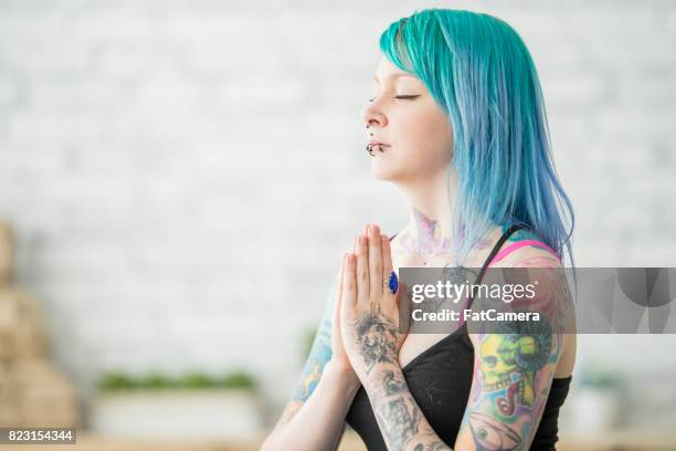 praying - septum stock pictures, royalty-free photos & images