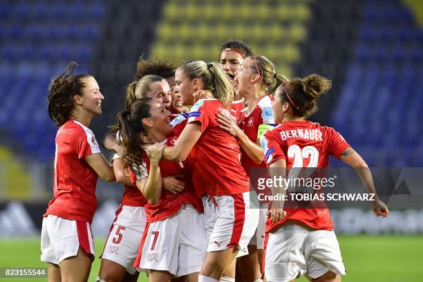 Switzerland's defender Ana-Maria Crnogorcevic celebrates with teammates after scoring a goal during the UEFA Women's Euro 2017 football match between...