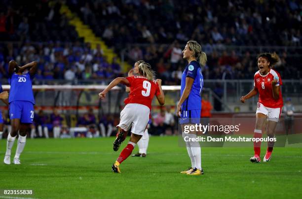 Ana Maria Crnogorcevic of Switzerland celebrate with her teammates after she heads the opening goal during the Group C match between Switzerland and...