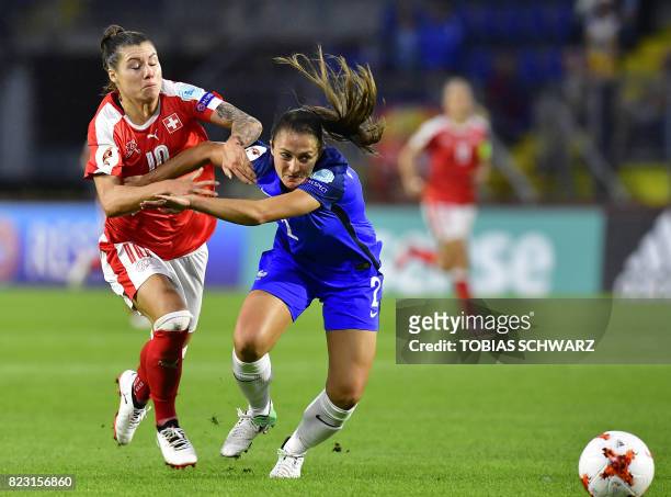 France's defender Eve Perisset challenges Switzerland's forward Ramona Bachmann during the UEFA Women's Euro 2017 football match between Switzerland...