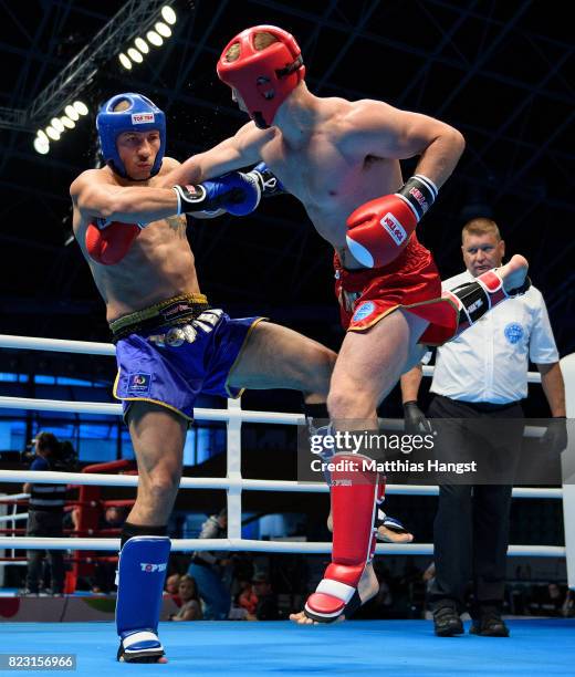 Arkadiusz Kaszuba of Poland fights against Ali Khanjari of Iran during the Invitation Sports Kickboxing Men's K1 81kg Quarterfinals of The World...