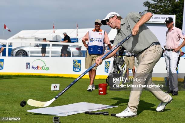 David Hearn of Canada plays hockey during the championship pro-am of the RBC Canadian Open at Glen Abbey Golf Course on July 26, 2017 in Oakville,...