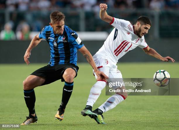 Yassine Benzia of LOSC Lille competes for the ball with Rafael Toloi of Atalanta BC during the pre-season friendly match between Atalanta BC and LOSC...