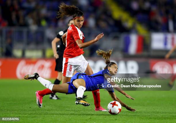Cinzia Zehnder of Switzerland and Sakina Karchaoui of France compete for the ball during the Group C match between Switzerland and France during the...