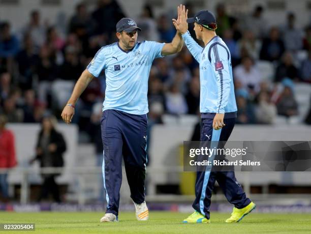 Tim Bresnan of Yorkshire celebrates with Matthew Fisher of Yorkshire during the NatWest T20 blast between Yorkshire Vikings and Durham at Headingley...