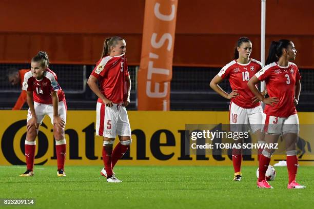 Switzerland's players react at the end of the UEFA Women's Euro 2017 football match between Switzerland and France at the Rat Verlegh Stadium in...