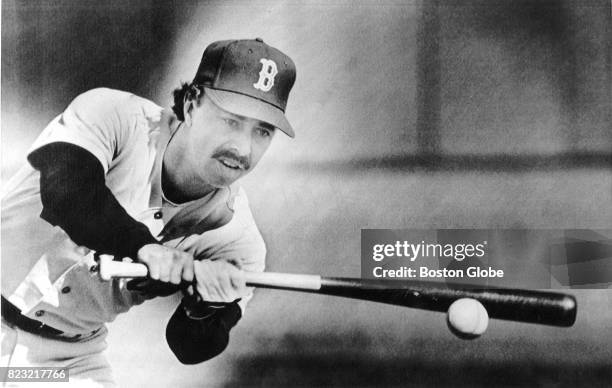 Red Sox Jerry Remy hits a ground ball to a teammate during practice at Winter Haven, Fl., Feb. 25, 1986.