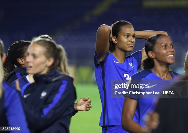 Wendie Renard of France blows out her cheeks as her and her team mates celebrate their result during the UEFA Women's Euro 2017 Group C match between...