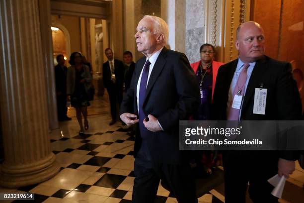 Sen. John McCain , who was recently diagnosed with brain cancer, leaves the Senate Chamber following votes in the U.S. Capitol July 26, 2017 in...