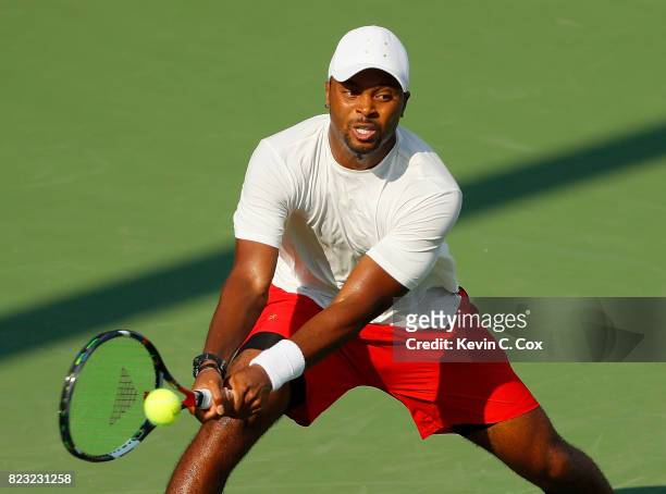 Donald Young returns a backhand to Lukas Lacko of Slovakia during the BB&T Atlanta Open at Atlantic Station on July 26, 2017 in Atlanta, Georgia.