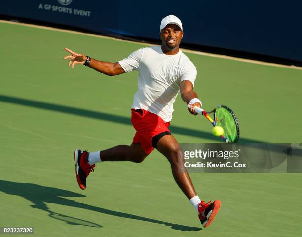 Donald Young returns a forehand to Lukas Lacko of Slovakia during the BB&T Atlanta Open at Atlantic Station on July 26, 2017 in Atlanta, Georgia.