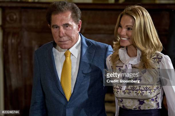 Billionaire Steve Wynn, chairman and chief executive officer of Wynn Resorts Ltd., left, and wife Andrea Hissom arrive to an event in the East Room...