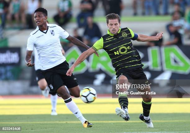 Sporting CP midfielder Adrien Silva from Portugal with Vitoria Guimaraes midfielder Bongani Zungu from South Africa in action during Pre-Season...