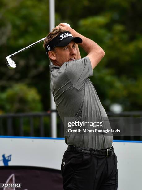 Ian Poulter of England hits a tee shot on the seventh hole during the championship pro-am of the RBC Canadian Open at Glen Abbey Golf Course on July...