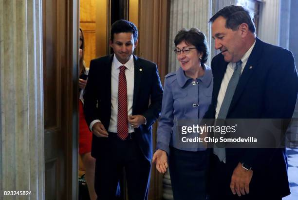 Sens. Brian Schatz , Susan Collins and Joe Donnelly head to the Senate Floor for a vote at the U.S. Capitol July 26, 2017 in Washington, DC. GOP...