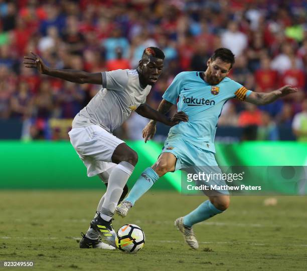 Paul Pogba of Manchester United in action with Lionel Messi of Barcelona during the International Champions Cup 2017 pre-season friendly match...