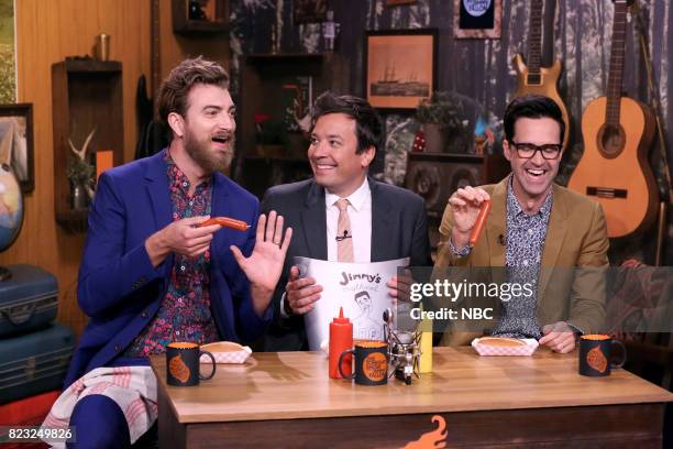 Episode 0712 -- Pictured: Rhett James McLaughlin and Charles Lincoln "Link" Neal III of Rhett & Link with Host Jimmy Fallon during "Will It Hot Dog"...