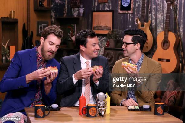 Episode 0712 -- Pictured: Rhett James McLaughlin and Charles Lincoln "Link" Neal III of Rhett & Link with Host Jimmy Fallon during "Will It Hot Dog"...