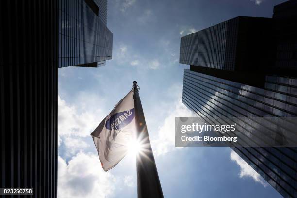 The Samsung Electronics Co. Corporate flag flies outside the company's Seocho office building in Seoul, South Korea, on Tuesday, July 25, 2017....