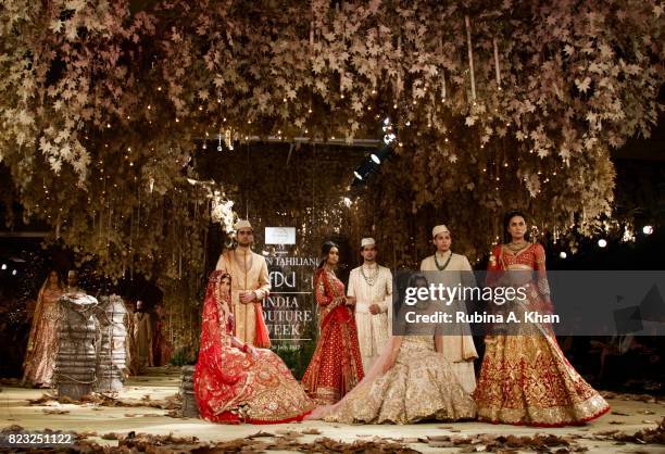 Master couturier Tarun Tahiliani exhibits his bridal couture collection 2017-18, "Tarakanna" during FDCI's India Couture Week 2017 at the Taj Palace...