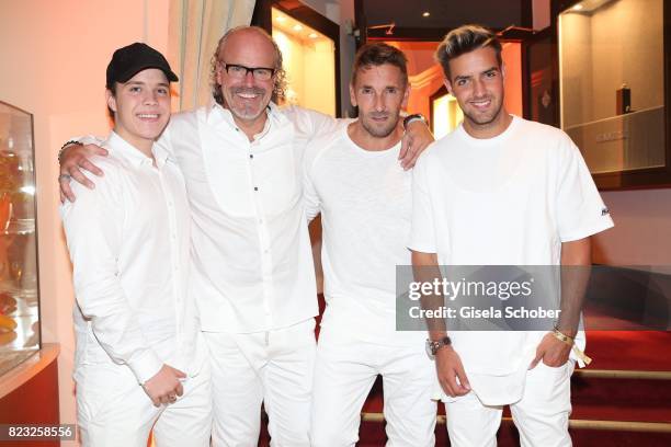 Peter Olsson and his son Linus Olsson, Mark Keller and his son Aaron Keller during the Hotel Vier Jahreszeiten summer party 'Eclat Dore' on July 26,...