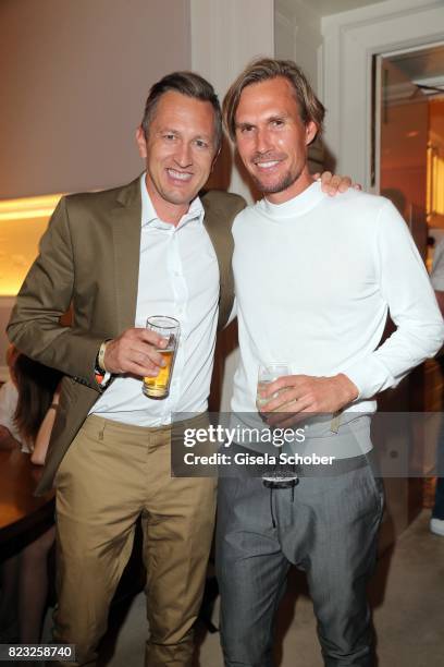 Thomas Isermann and Tino Schuster during the Hotel Vier Jahreszeiten summer party 'Eclat Dore' on July 26, 2017 in Munich, Germany.