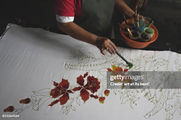 coloring batik - malaysia batik stock pictures, royalty-free photos & images