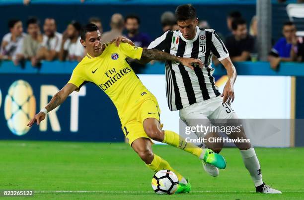 Marco Verratti of Paris Saint-Germain vie for possession with Rodrigo Bentancur of Juventus in the first half during their International Champions...