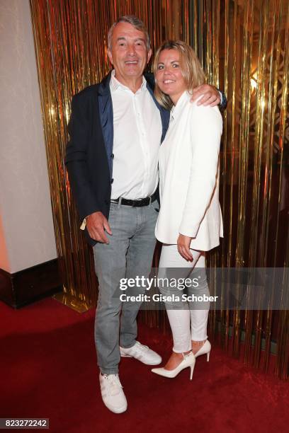 Wolfgang Niersbach and his girlfriend Marion Popp during the Hotel Vier Jahreszeiten summer party 'Eclat Dore' on July 26, 2017 in Munich, Germany.