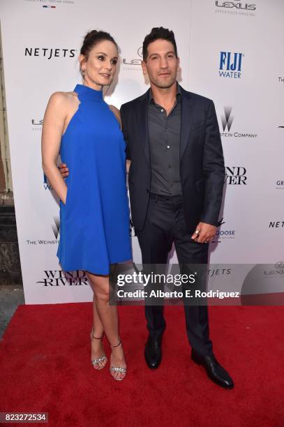 Actors Sarah Wayne Callies and Jon Bernthal attend the premiere of The Weinstein Company's "Wind River" at The Theatre at Ace Hotel on July 26, 2017...