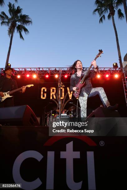 Guitarist Moni Scaria and singer/bassist John Payne of the band ASIA featuring John Payne perform onstage at Citi Presents Journey former lead...