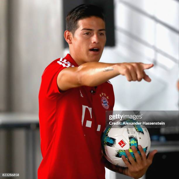 James Rodriguez of FC Bayern Muenchen reacts after performing football skills at JW Marriott Singapore South Beach Hotel during the Audi Summer Tour...