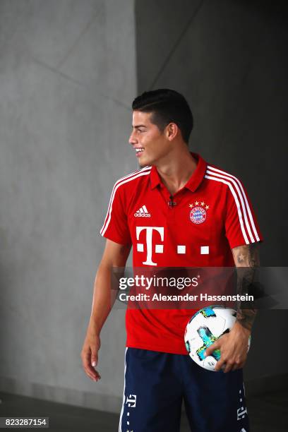 James Rodriguez of FC Bayern Muenchen smiles after performing football skills at JW Marriott Singapore South Beach Hotel during the Audi Summer Tour...